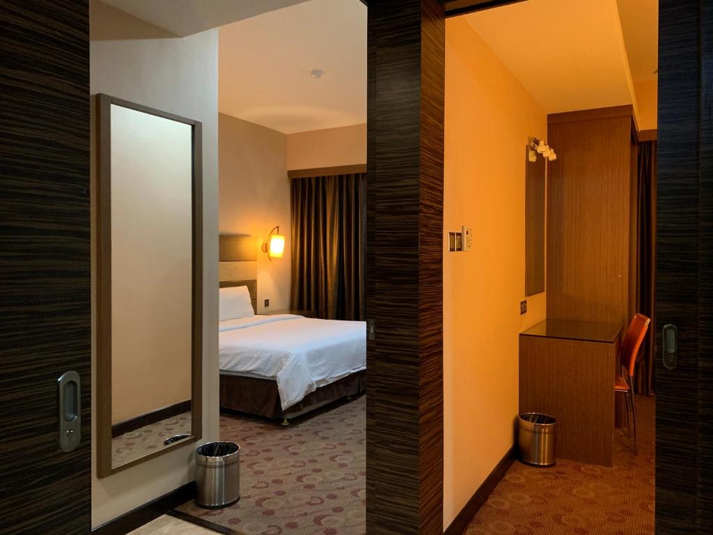 Postel nebo postele na pokoji v ubytování Sento Hotel