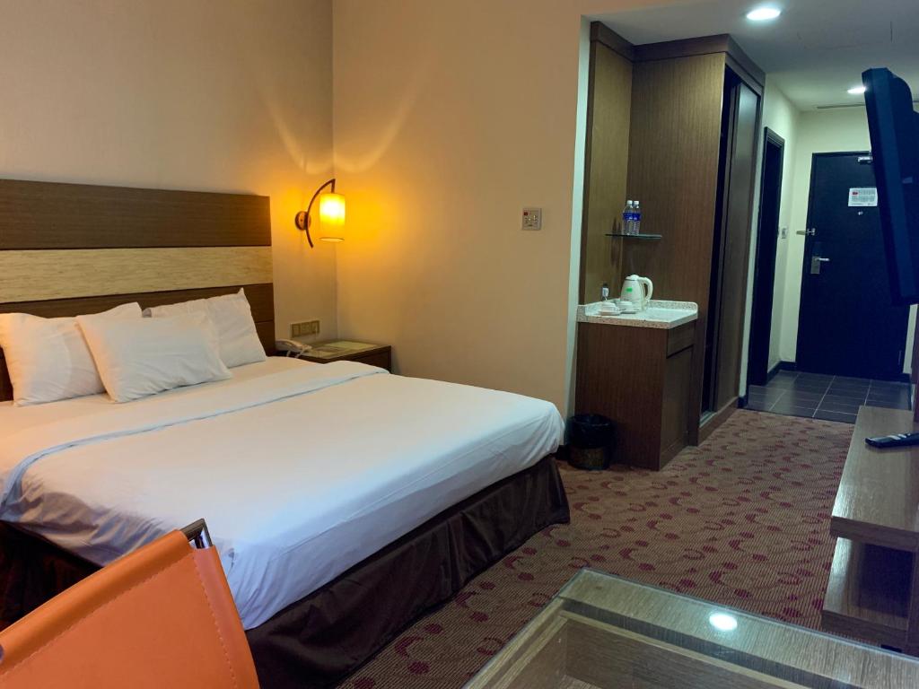 Postel nebo postele na pokoji v ubytování Sento Hotel