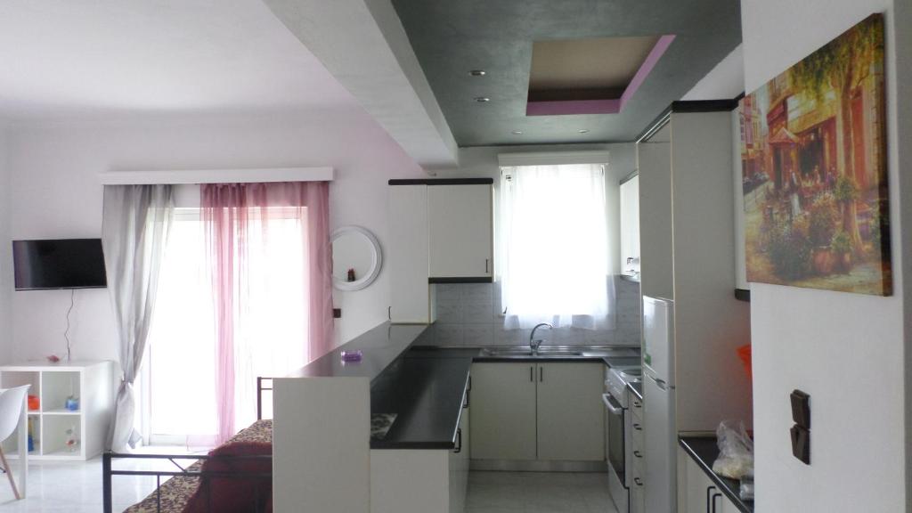Kuchyň nebo kuchyňský kout v ubytování Top Holidays Apartments