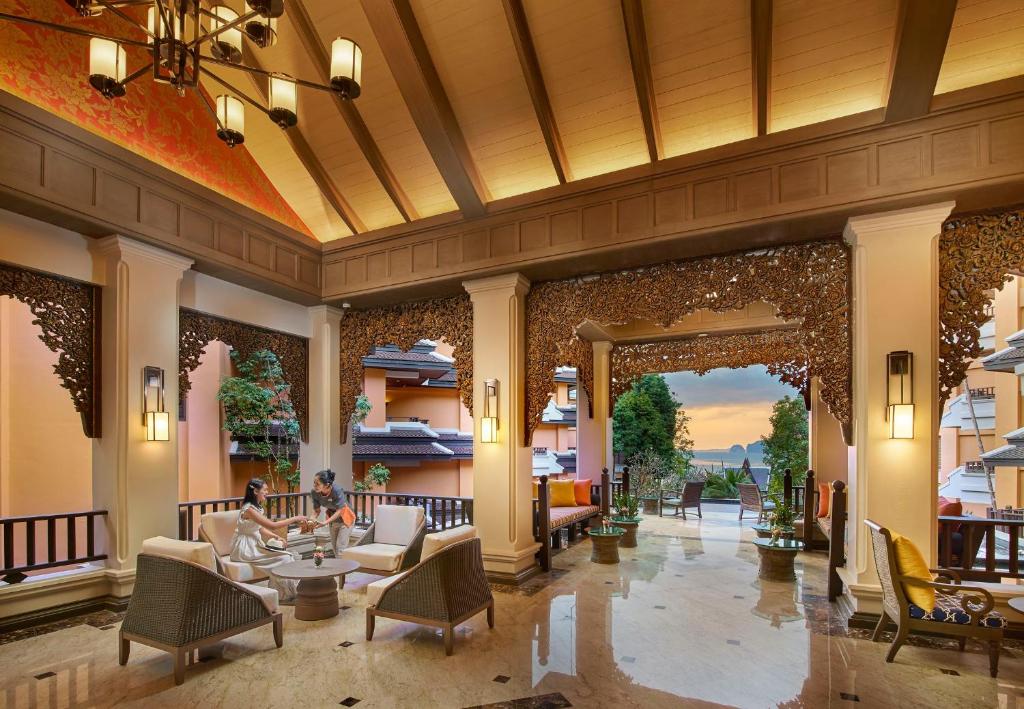 a lobby of a resort with people sitting on couches at Amari Vogue Krabi in Tab Kaek Beach