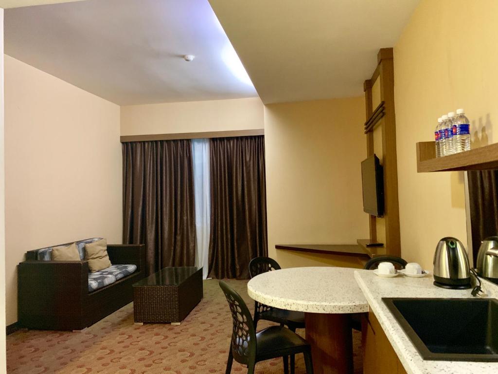 Kuchyň nebo kuchyňský kout v ubytování Sento Hotel