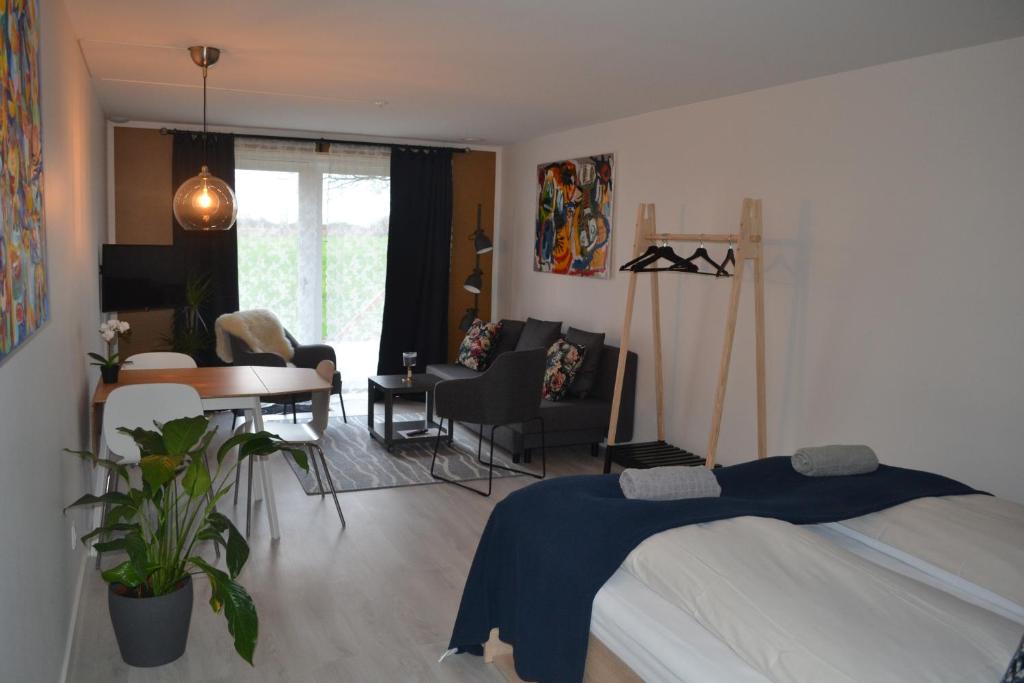 Postel nebo postele na pokoji v ubytování AD Apartment