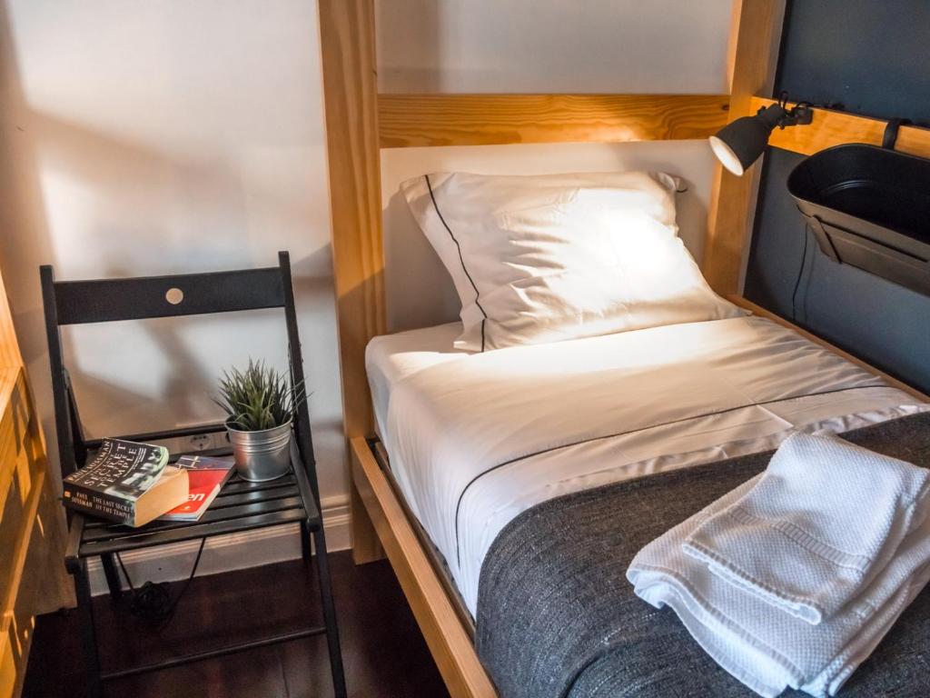 Postel nebo postele na pokoji v ubytování Procyon Boutique & Suites