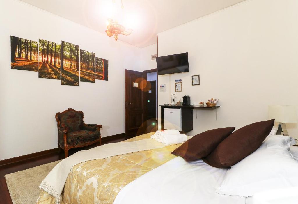 Postel nebo postele na pokoji v ubytování Vitti's Home Verona