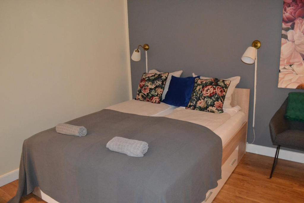 Postel nebo postele na pokoji v ubytování AD Apartment