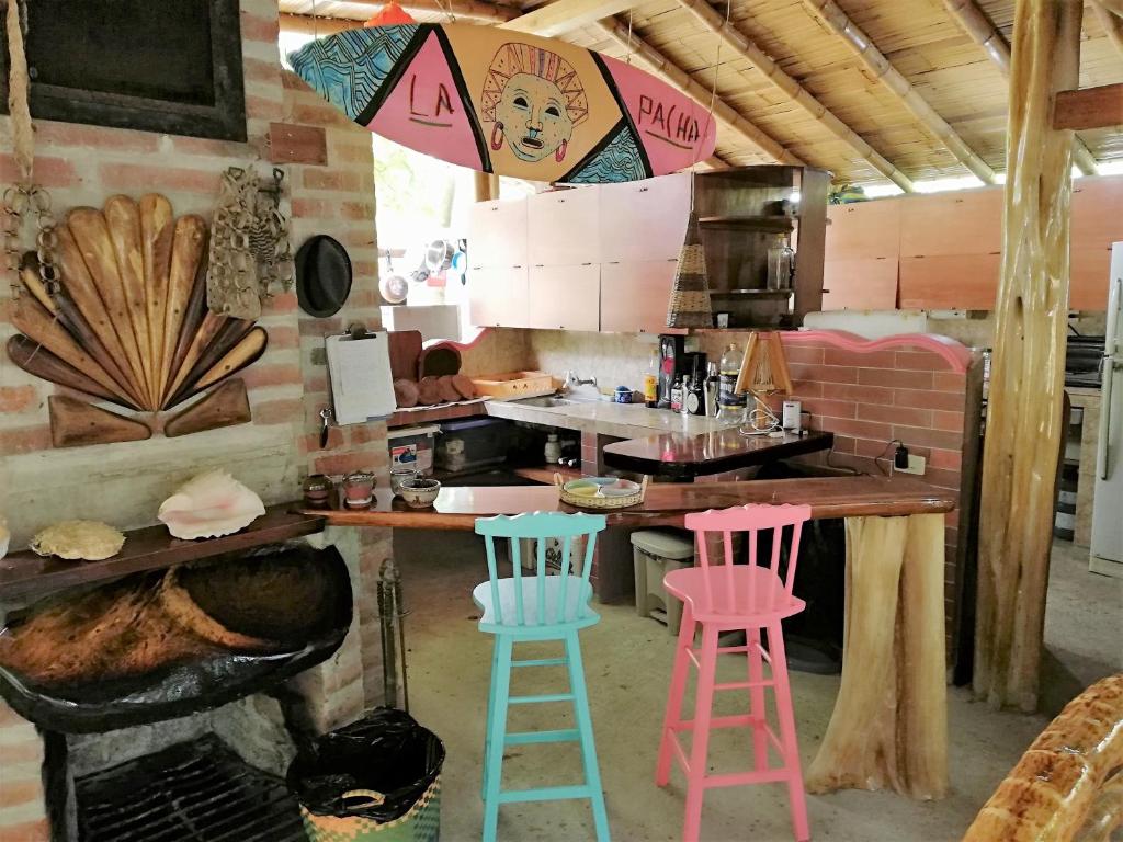 Kuchyň nebo kuchyňský kout v ubytování Hostal Oloncito
