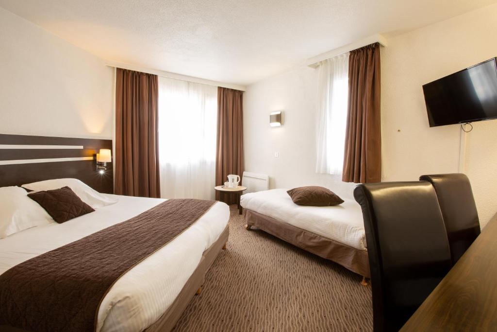 Postel nebo postele na pokoji v ubytování Hotel Chantereyne