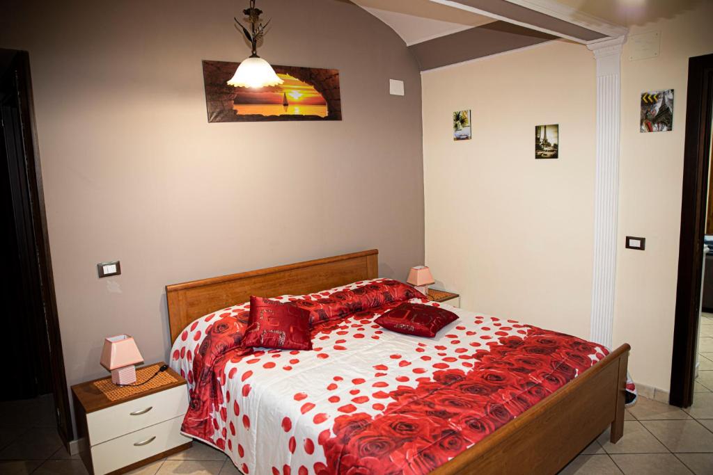 A bed or beds in a room at Casa Vacanze Etna