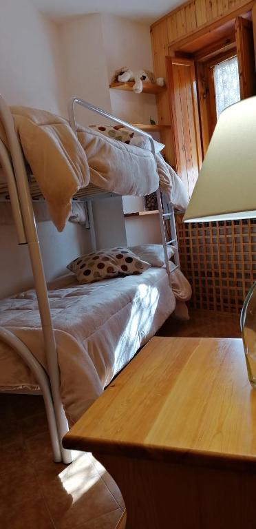 A bed or beds in a room at Pescocostanzo Centro