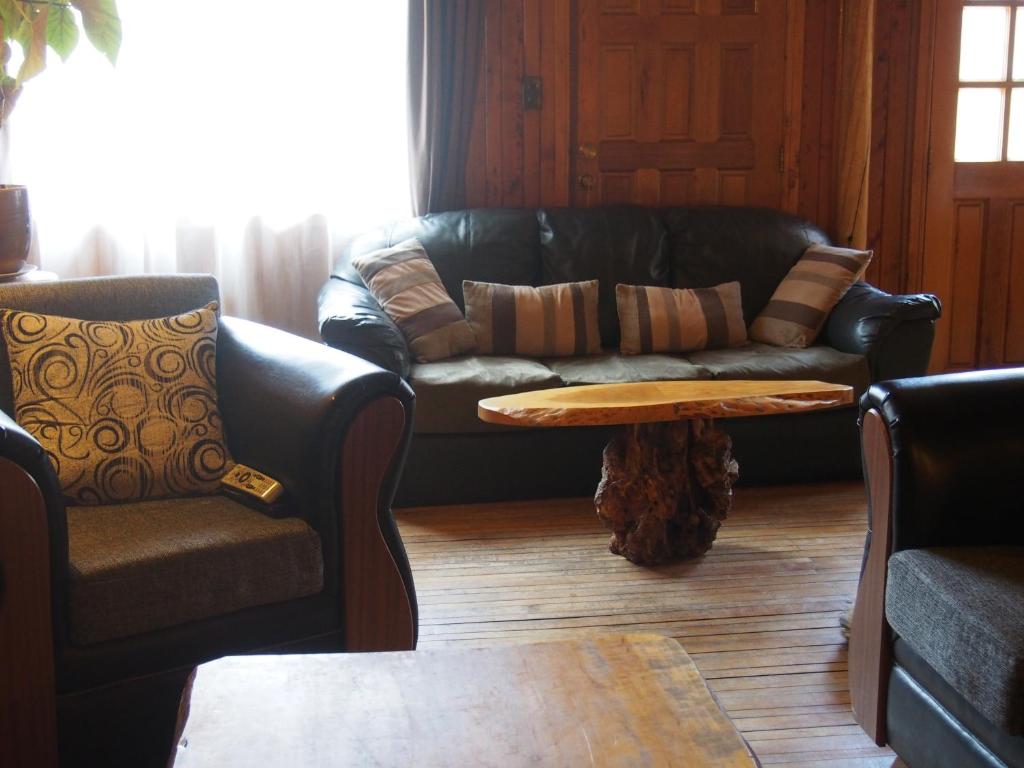 Ein Sitzbereich in der Unterkunft Hotel Último Paraíso