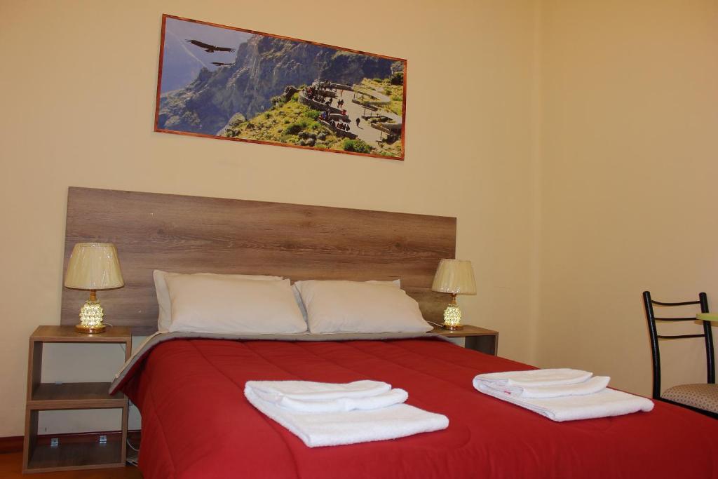 Postel nebo postele na pokoji v ubytování Holidays Hostel Arequipa