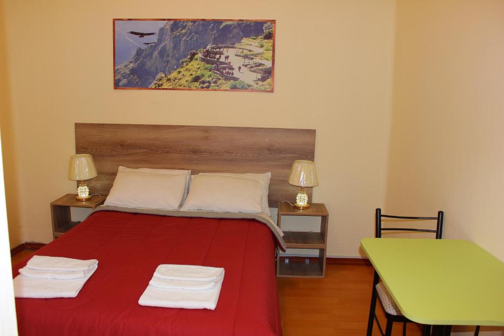 Postel nebo postele na pokoji v ubytování Holidays Hostel Arequipa