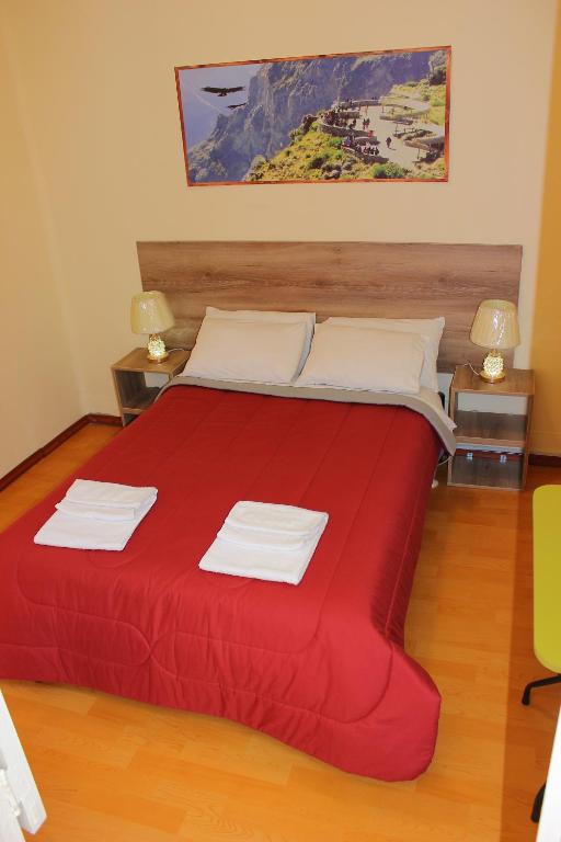 Postel nebo postele na pokoji v ubytování Holidays Hostel Arequipa