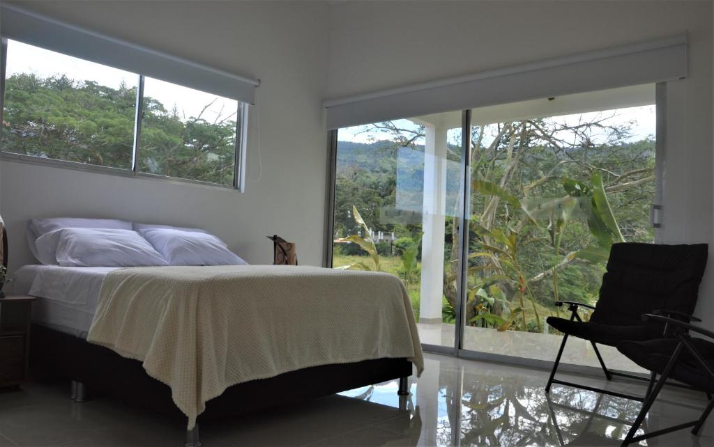 Ένα ή περισσότερα κρεβάτια σε δωμάτιο στο San Juan de los Guayabos