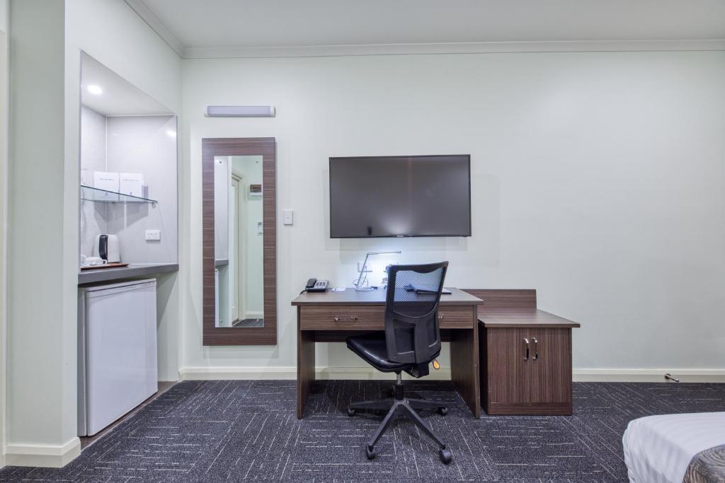 TV a/nebo společenská místnost v ubytování Best Western Melbourne Airport