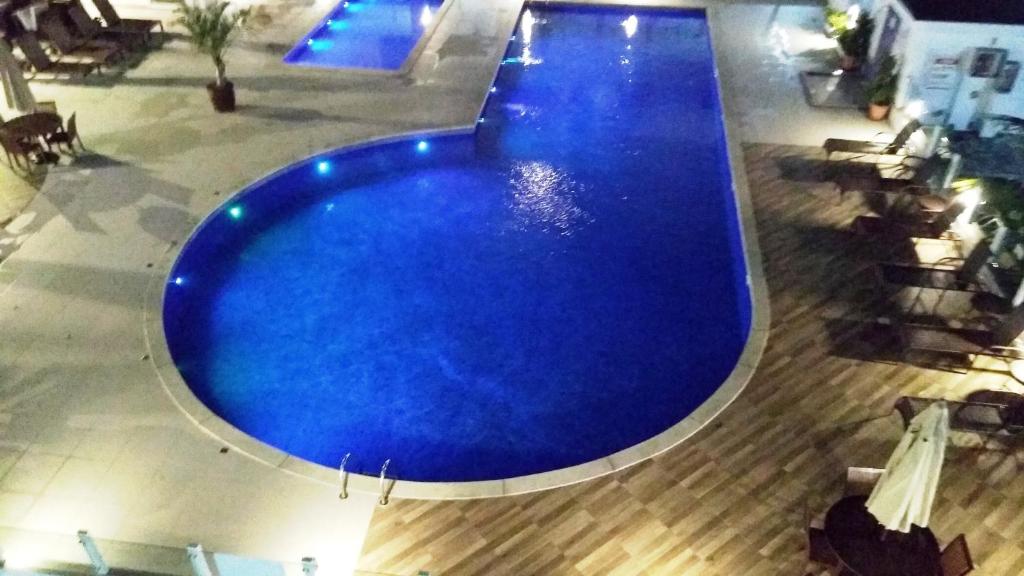  Apartamento novo frente para a piscina região nobre da praia dos Ingleses