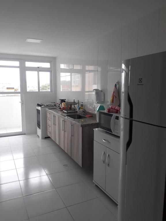  Apto. Novo 2 Suítes - 2min a pé da Praia Grande