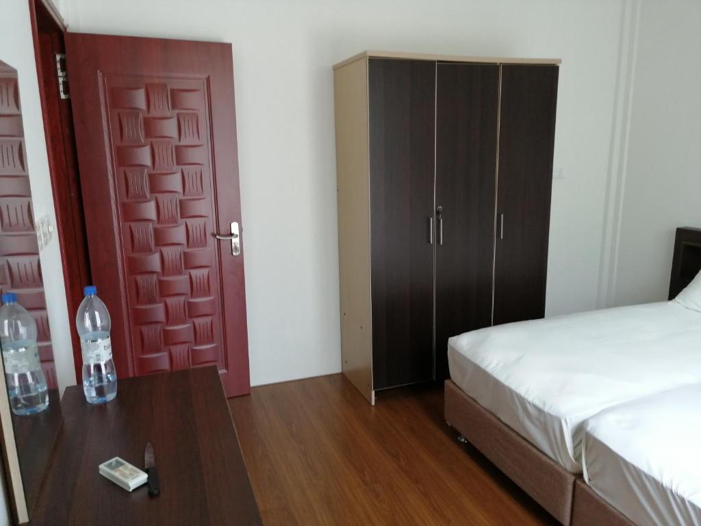 Postel nebo postele na pokoji v ubytování Fali Guest House