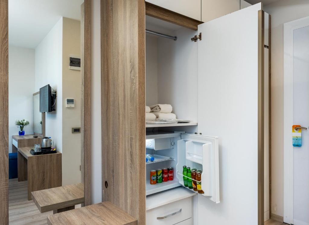 Kuchyň nebo kuchyňský kout v ubytování Anelli Hotel