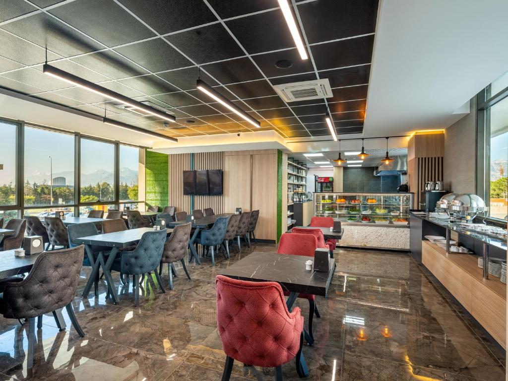 TV a/nebo společenská místnost v ubytování Anelli Hotel