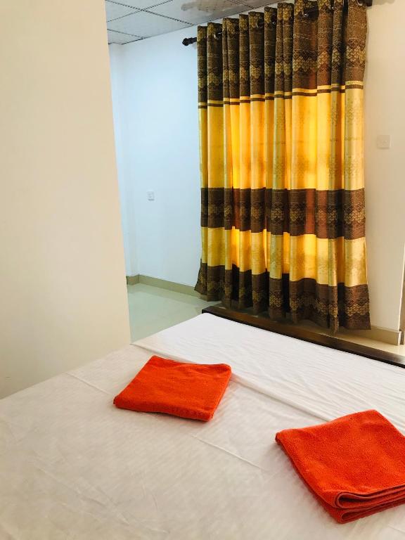Postel nebo postele na pokoji v ubytování Medawatta Villa