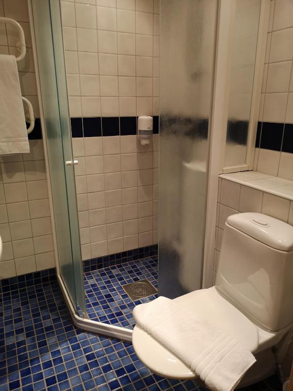 Koupelna v ubytování Hotell Åsen