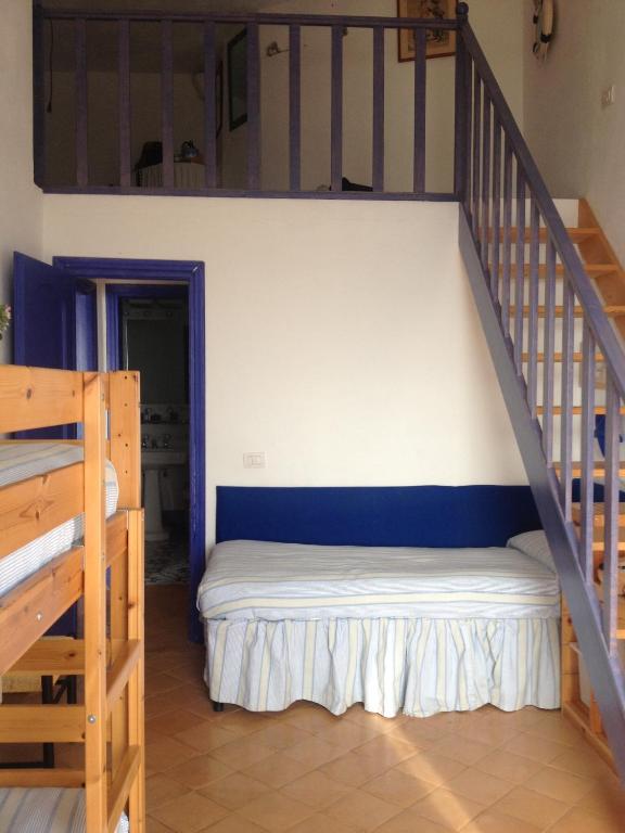 Posteľ alebo postele v izbe v ubytovaní La casa sulla scogliera