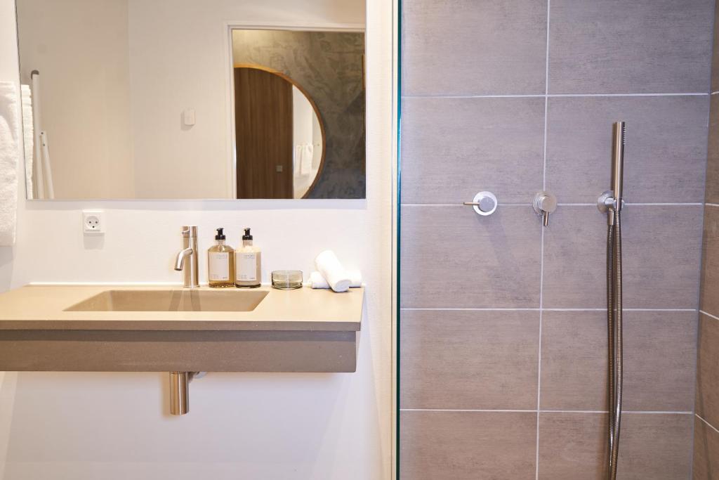 Koupelna v ubytování Hotel GUESTapart