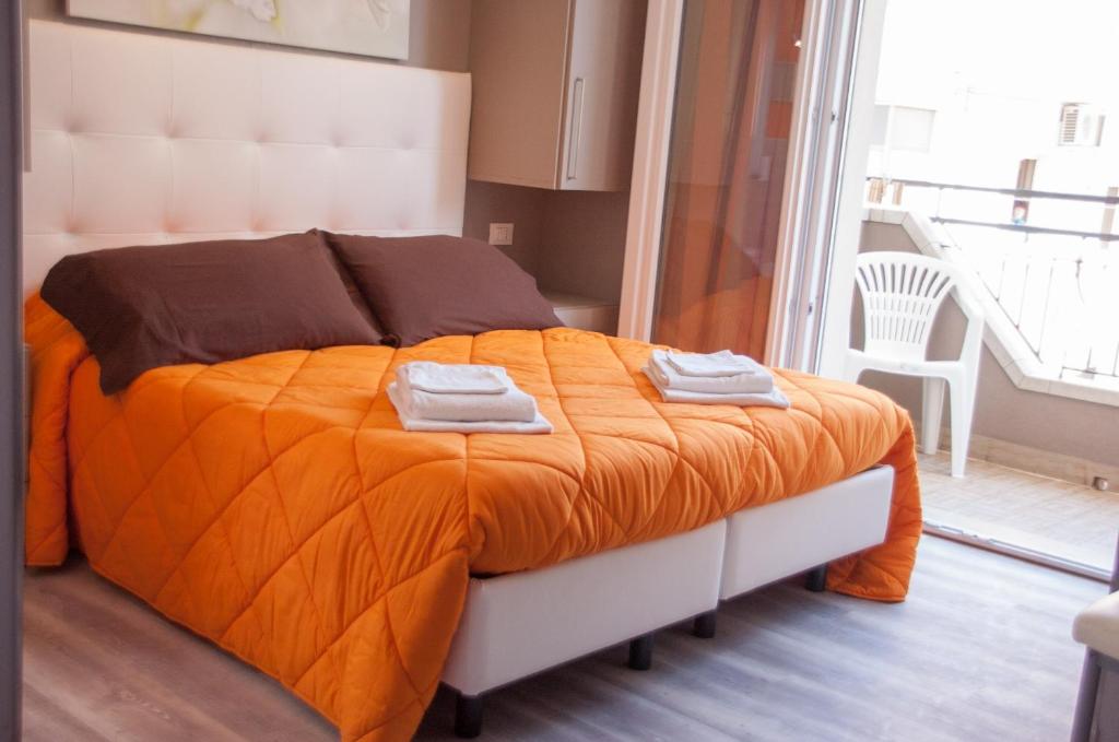 Postel nebo postele na pokoji v ubytování Albergo Villa Miraggio