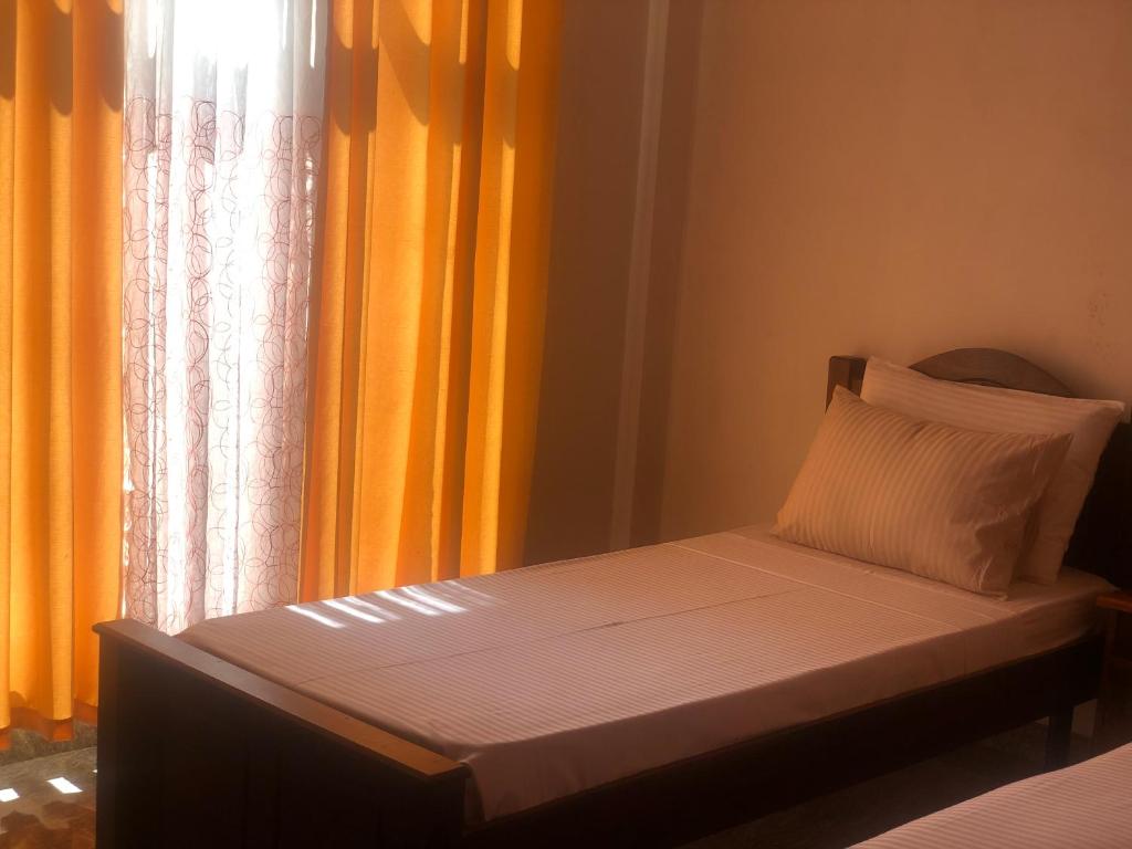 Postel nebo postele na pokoji v ubytování Fernando's Inn