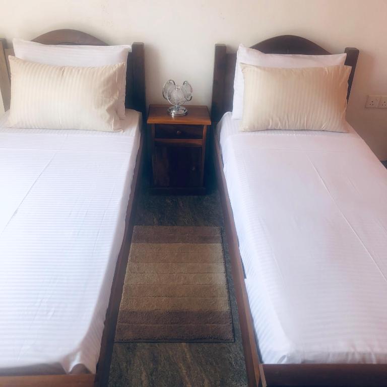 Postel nebo postele na pokoji v ubytování Fernando's Inn