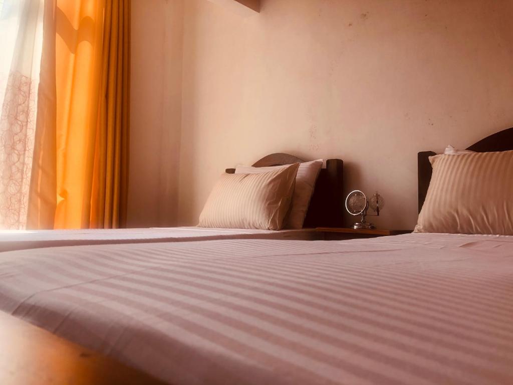 Postel nebo postele na pokoji v ubytování Fernando's Inn