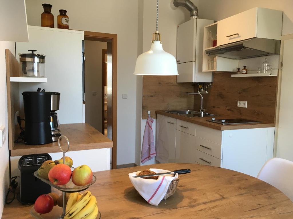 A kitchen or kitchenette at Apartments am Park