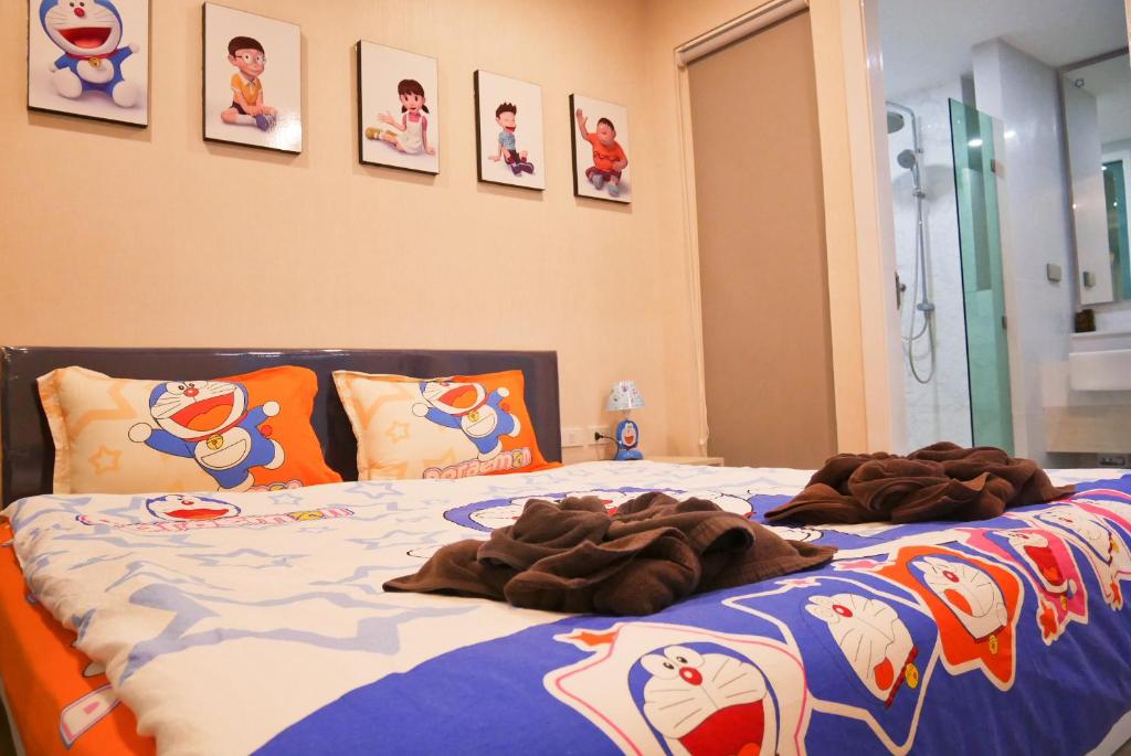Postel nebo postele na pokoji v ubytování Seven Seas Resort Pattaya & Sofa bed