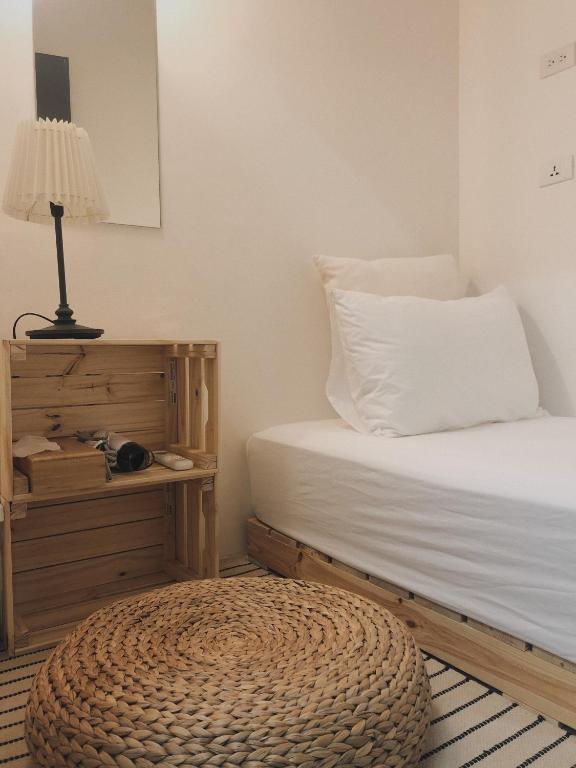 Postel nebo postele na pokoji v ubytování PlainStay Hostel