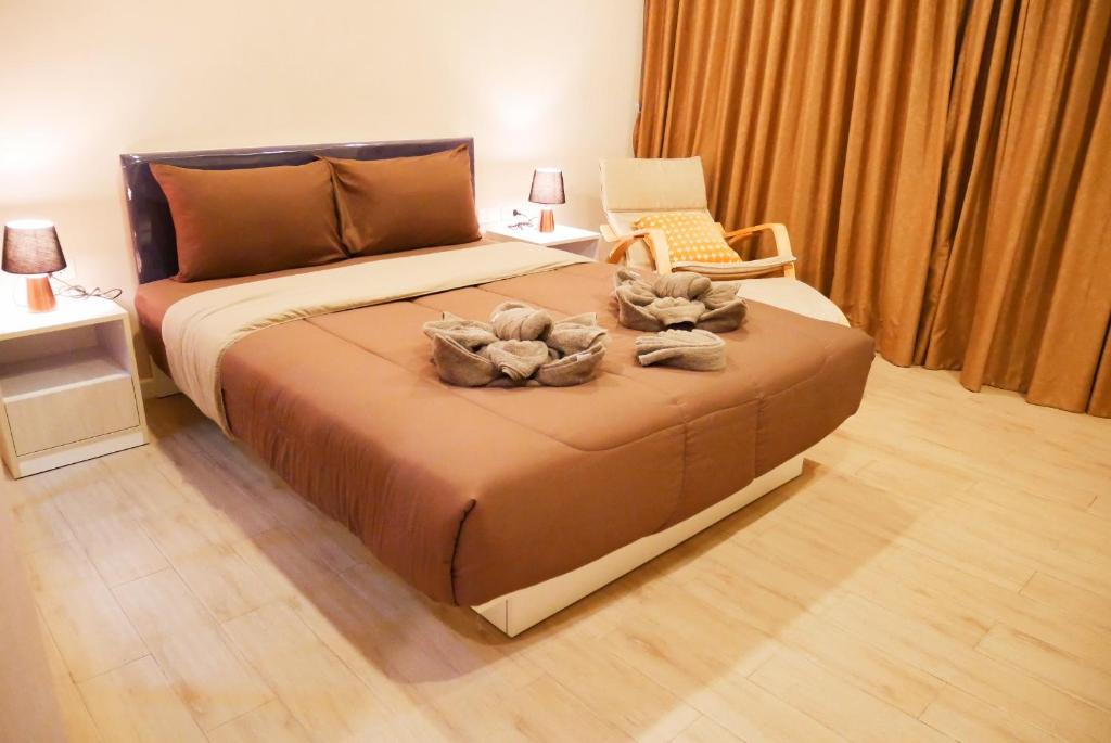 Postel nebo postele na pokoji v ubytování Seven Seas Resort Pattaya & Sofa bed