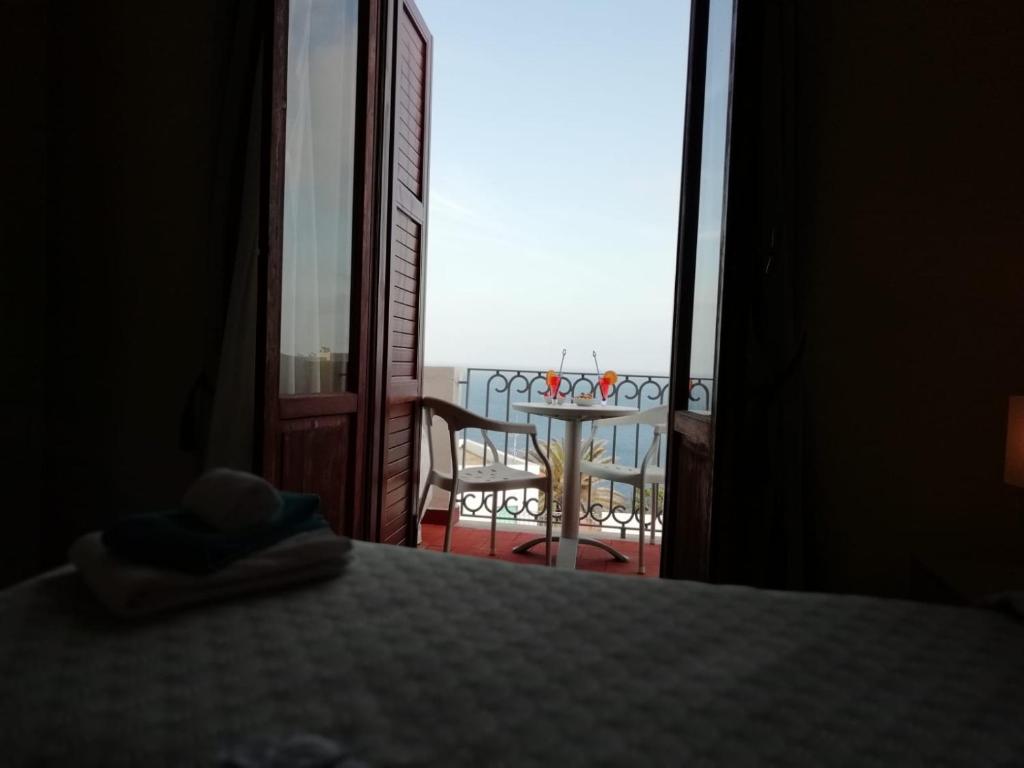 Postel nebo postele na pokoji v ubytování Hotel Calabattaglia