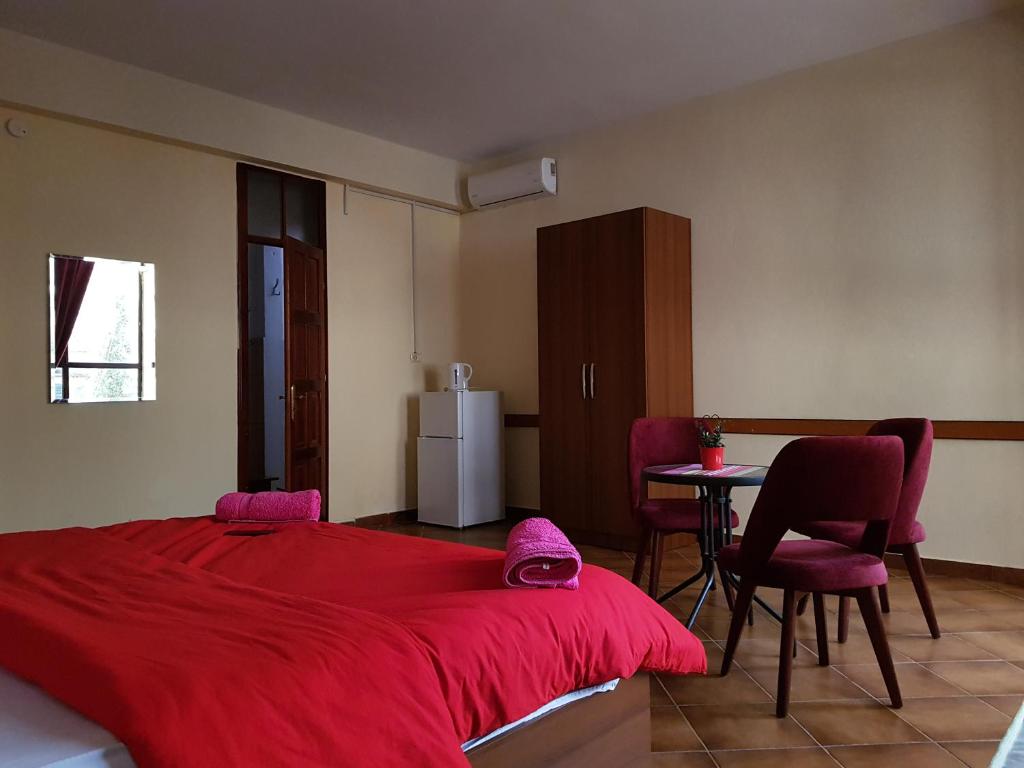 Cama o camas de una habitación en Hotel Kurtabeg