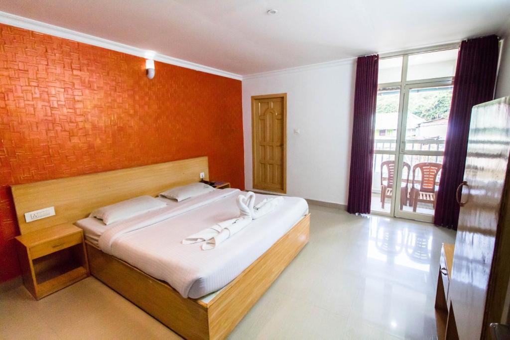 Postel nebo postele na pokoji v ubytování Eden Holidays EV