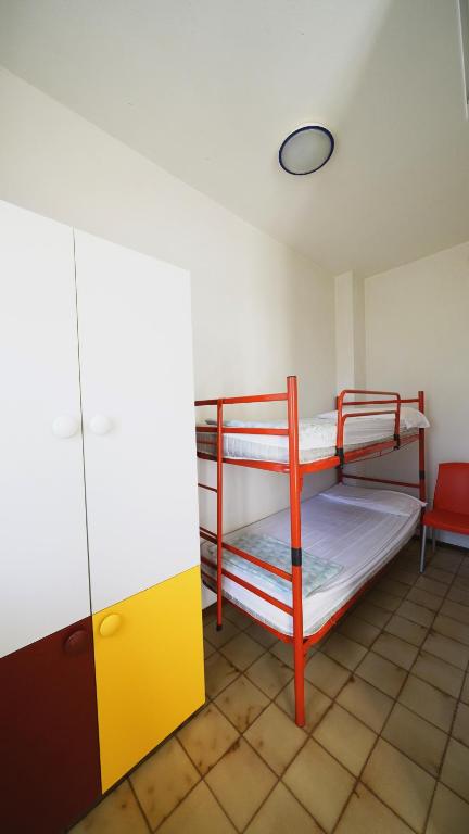 Postel nebo postele na pokoji v ubytování Appartamento Aurora