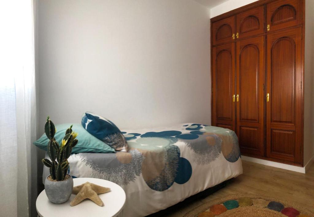 A bed or beds in a room at Casa Capricho