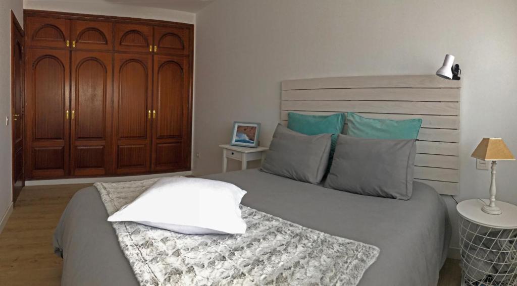 A bed or beds in a room at Casa Capricho
