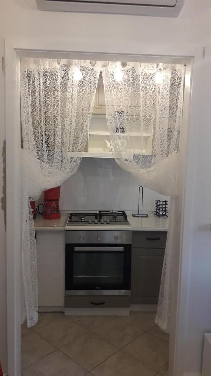 Dapur atau dapur kecil di Apartment Bella