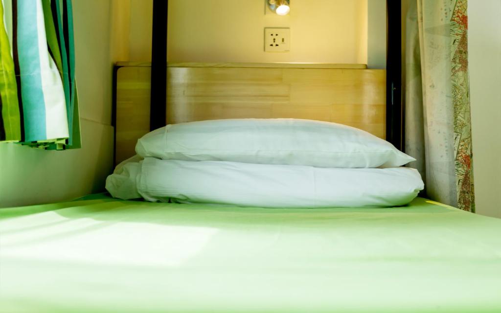 Letto o letti in una camera di Yesinn @YMT