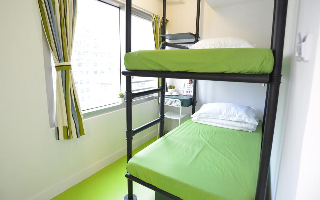 Letto o letti in una camera di Yesinn @YMT