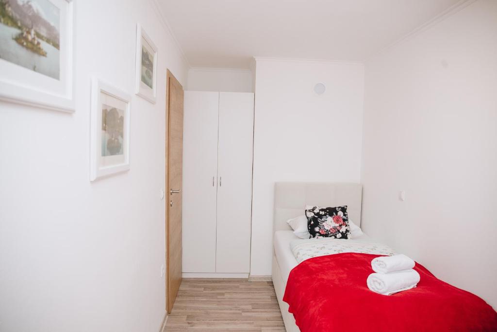 Postel nebo postele na pokoji v ubytování Grom Ribno Apartments