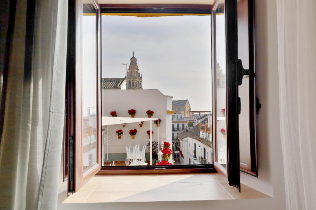 an open window with a view of a building at Posada La Judería I in Córdoba