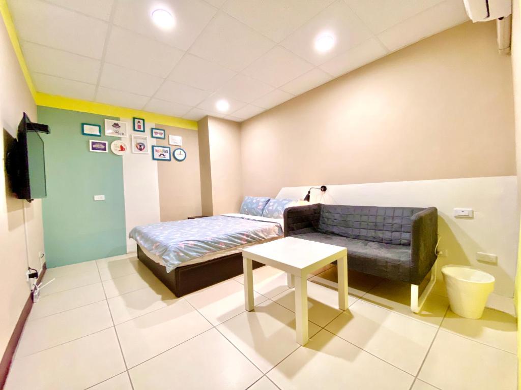 Postel nebo postele na pokoji v ubytování Wei Yang Guest House