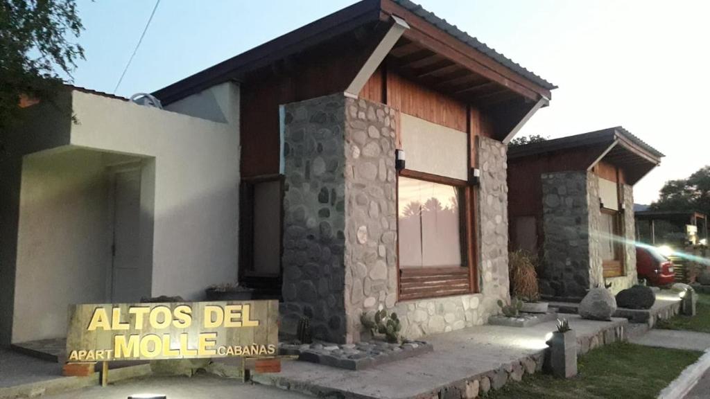 a house with a sign in front of it at Altos del Molle SF in San Francisco del Monte de Oro