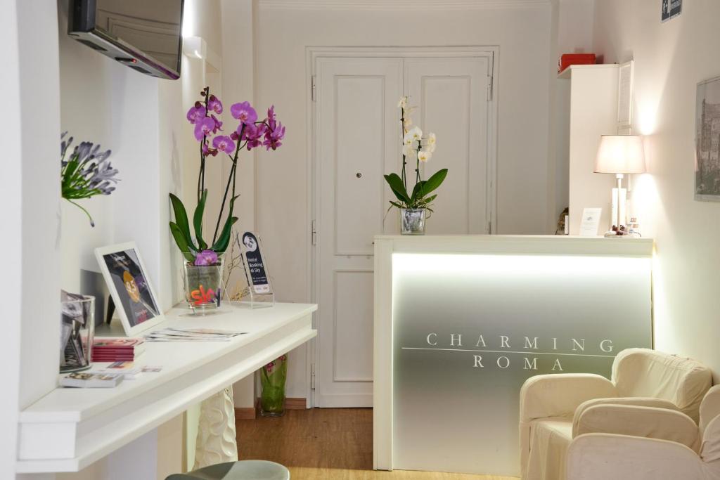 TV a/nebo společenská místnost v ubytování Charming Roma